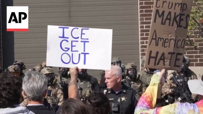 ICE protesters confront federal agents at immigration facility in Illinois (Video)