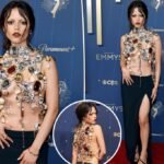 Jenna Ortega is draped in jewels (and not much else) on Emmys 2025 red carpet