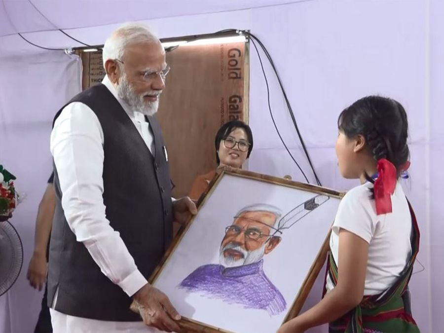 Manipur: PM Modi interacts with locals in Churachandpur, children gift him portrait