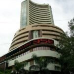 Nifty, Sensex open flat amid cautious sentiment ahead of rate cut decisions in 16 central banks globally