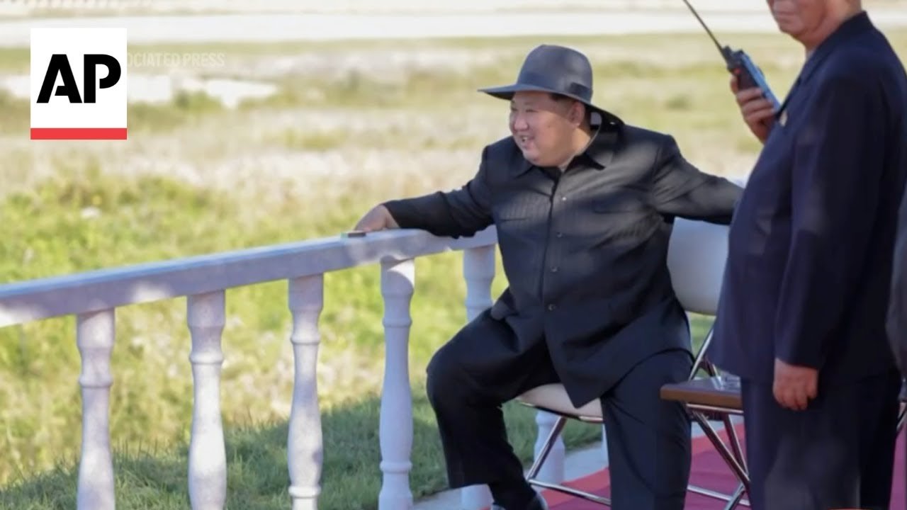 North Korean state media show Kim Jong Un inspecting drone and missile exercises (Video)