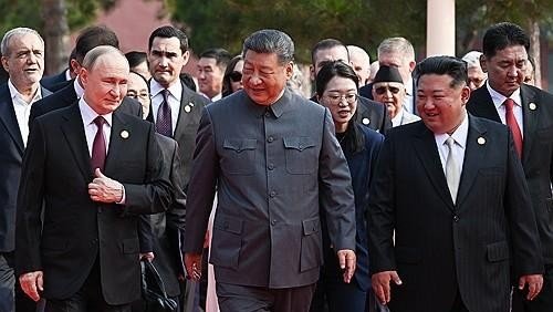 North Korea's Kim Jong-un joins Putin and Xi at military parade, first such gathering in 66 years