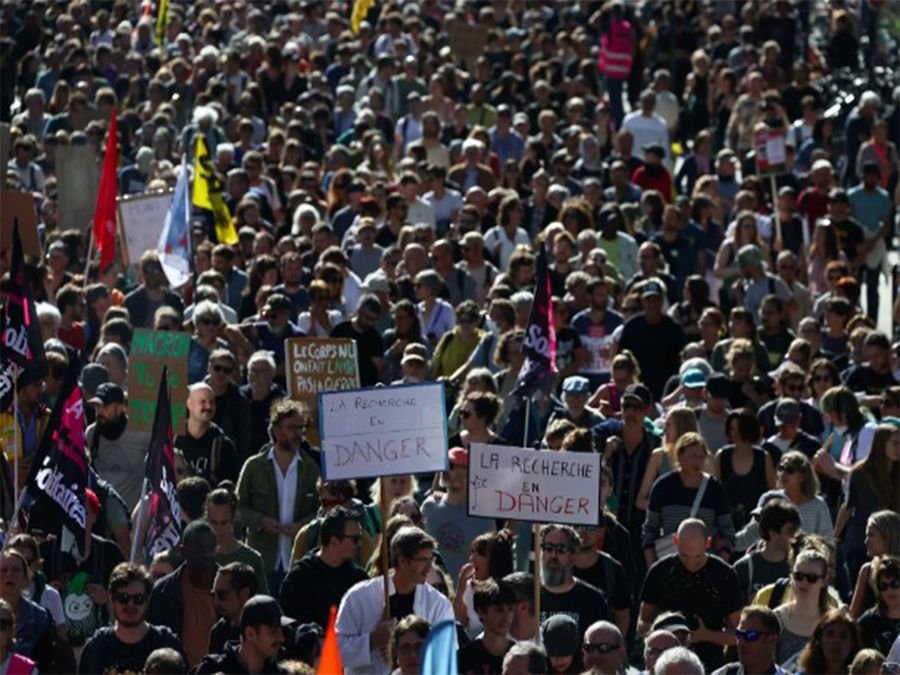 Thousands protest in France against Macron's austerity policies