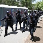 Toronto police arrest six at Christie Pits Park during pro and anti-immigration rival rallies