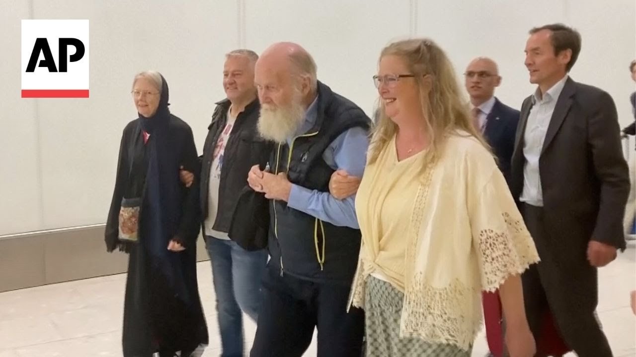 British couple held for months in Afghanistan on undisclosed charges arrive in UK (Video)