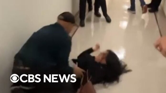 ICE officer returns to duty after being caught on video pushing woman to ground (Video)