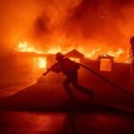 California Authorities charge man with starting deadly fire that levelled wealthy LA neighbourhood