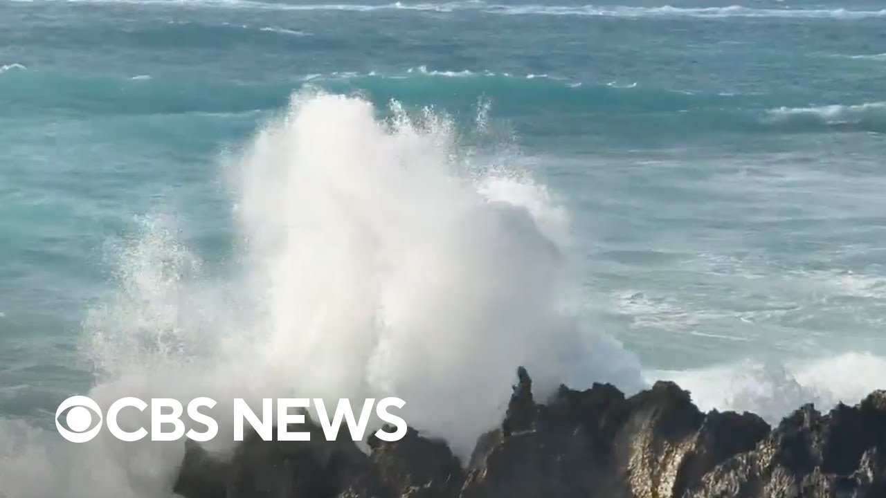 See: Swirling twin hurricanes Imelda and Humberto impact shorelines (Video)
