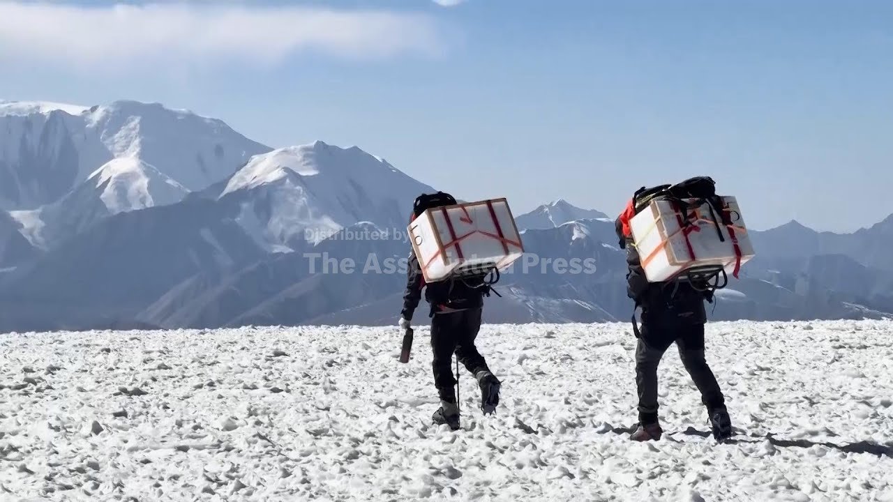 Watch Video Scientists trek Tajikistan mountains to obtain ice core samples to learn about global warming