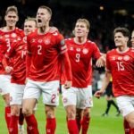Denmark stay top with 3-1 World Cup qualifying win over Greece