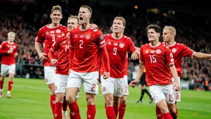 Denmark stay top with 3-1 World Cup qualifying win over Greece