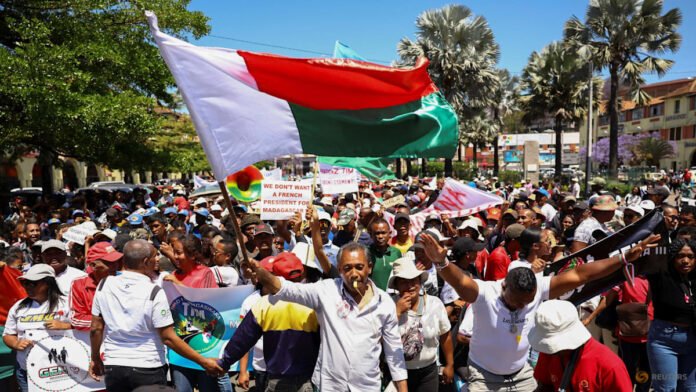 Madagascar president hangs on to power as thousands protest
