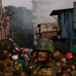 Bangladesh official blames locked door, toxic gas for deaths in factory fire