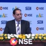 SEBI chief warns investors on fraudsters offering guaranteed returns