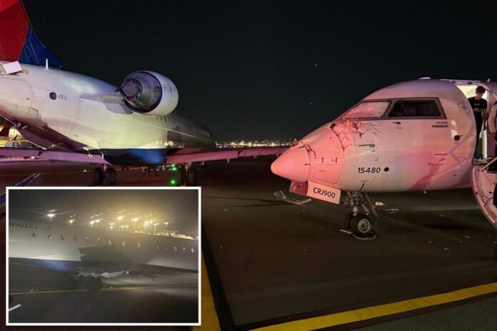 Two Delta planes collide while taxiing at LaGuardia Airport, injuring 1