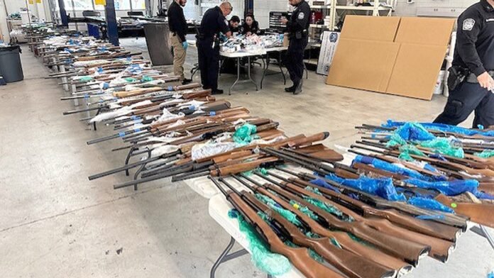 Father and son arrested for allegedly smuggling 400 firearms into Father and son arrested for allegedly smuggling 400 firearms into Mexico from US