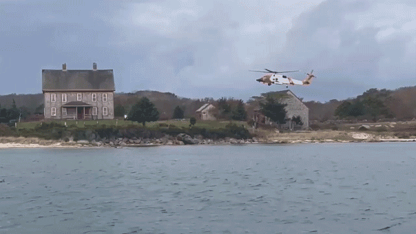 Woman dies after Coast Guard rescues family stranded on island Woman dies after Coast Guard rescues family stranded on island fleeing boat fire