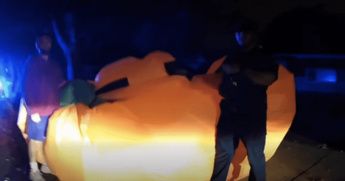 Footage captures police struggle to capture giant runaway inflatable pumpkin