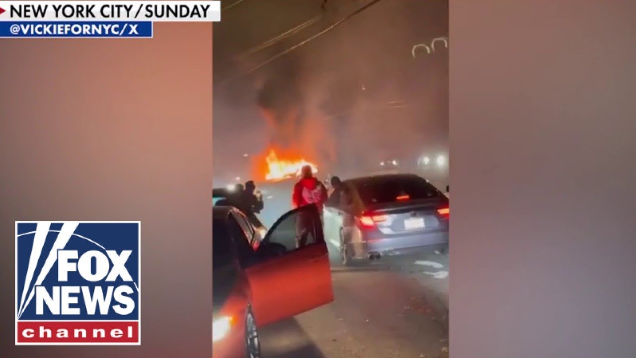 SEE IT: Violent mob attacks couple, burns car during street takeover (Video) 6 SEE IT: Violent mob attacks couple, burns car during street takeover (Video)