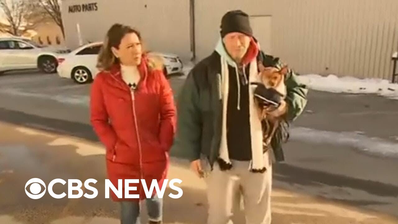 Iowa man braving frigid cold temperatures in car with his dog gets help (Video)
