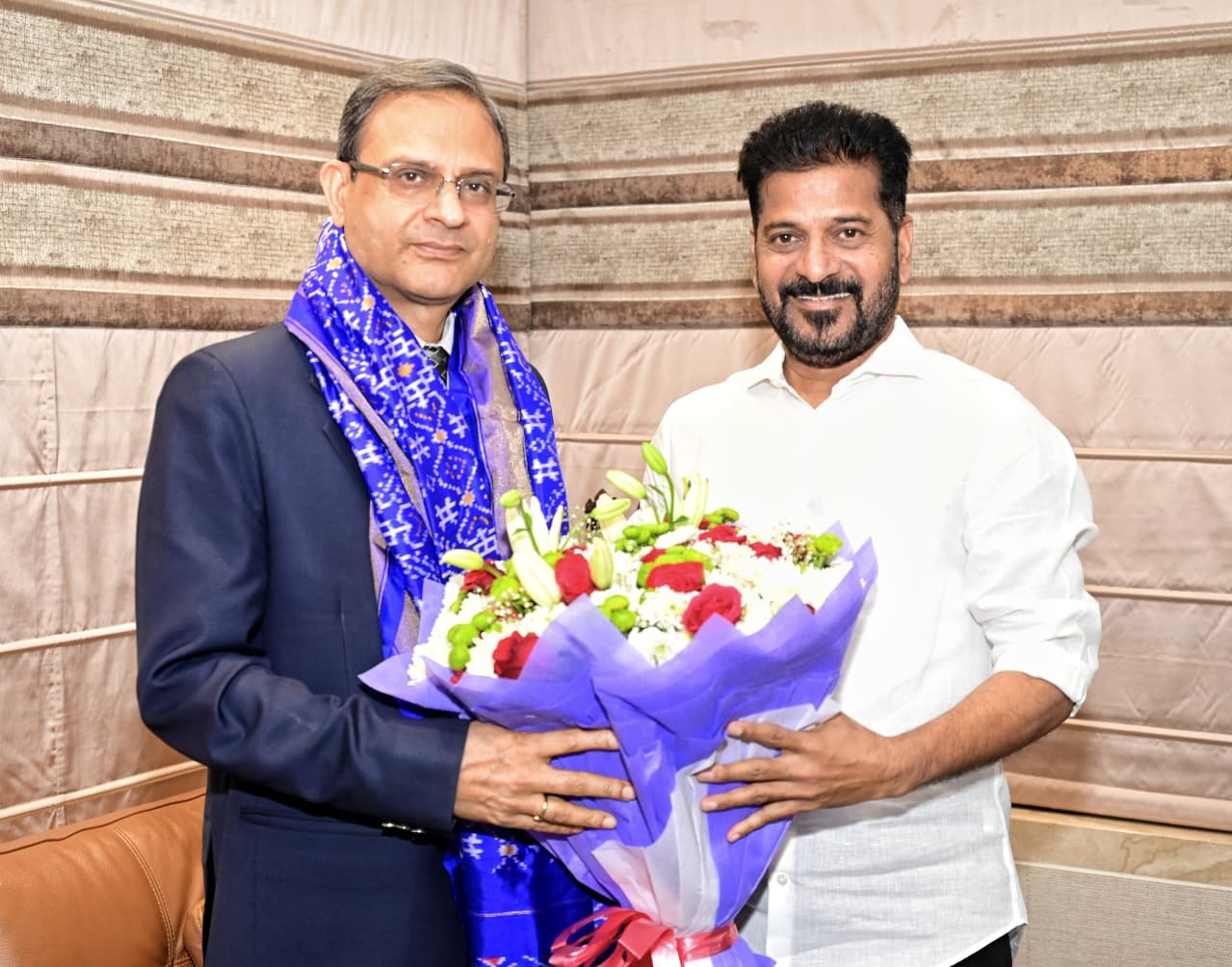 RBI Guv calls on Telangana CM, praises state's economic policies