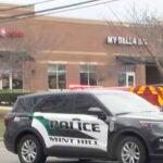 Man killed after firing at police during child custody exchange in quiet North Carolina suburb