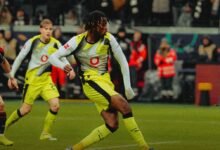 Football: Wasteful Dortmund snatch late point in Frankfurt thriller