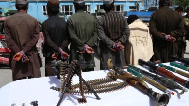 Afghan police find arms in car, arrest two suspects