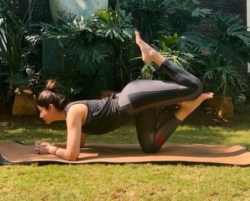Shilpa Shetty claims Vyaghrasana improves balance, strengthens back & core