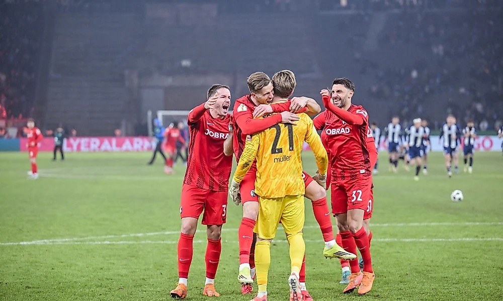 Freiburg advance to German Cup semis after shootout drama